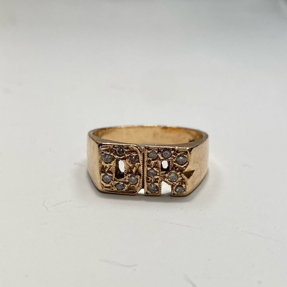 Gold “old school” DR initial ring in diamond.